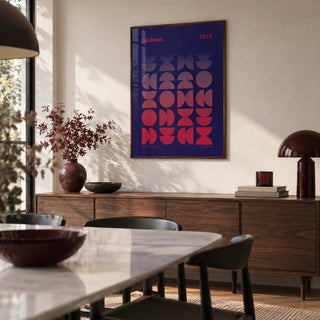 Graphic Design Poster, framed on the wall of a modern dining room