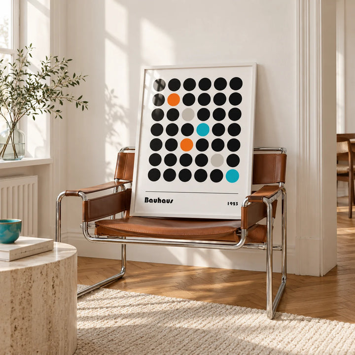 Graphic Prints, framed on the wall of a bright white room with tall white walls and warm herringbone oak parquet in soft morning light in a living room