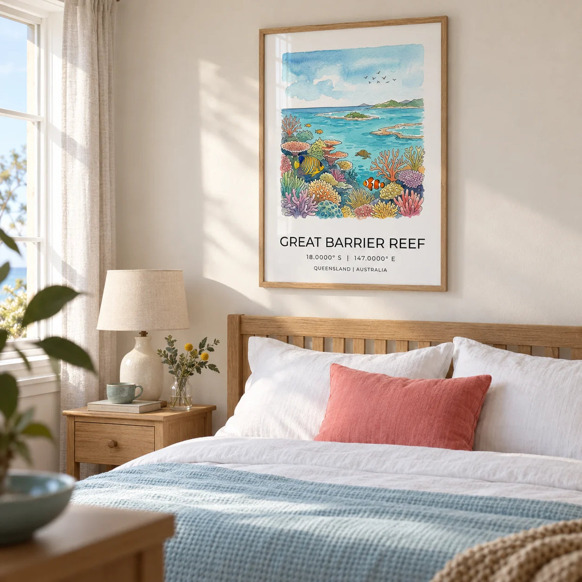 Great Barrier Reef Art Print, framed on the wall of a calm coastal bedroom in a UK family home with warm white walls and pale timber furniture