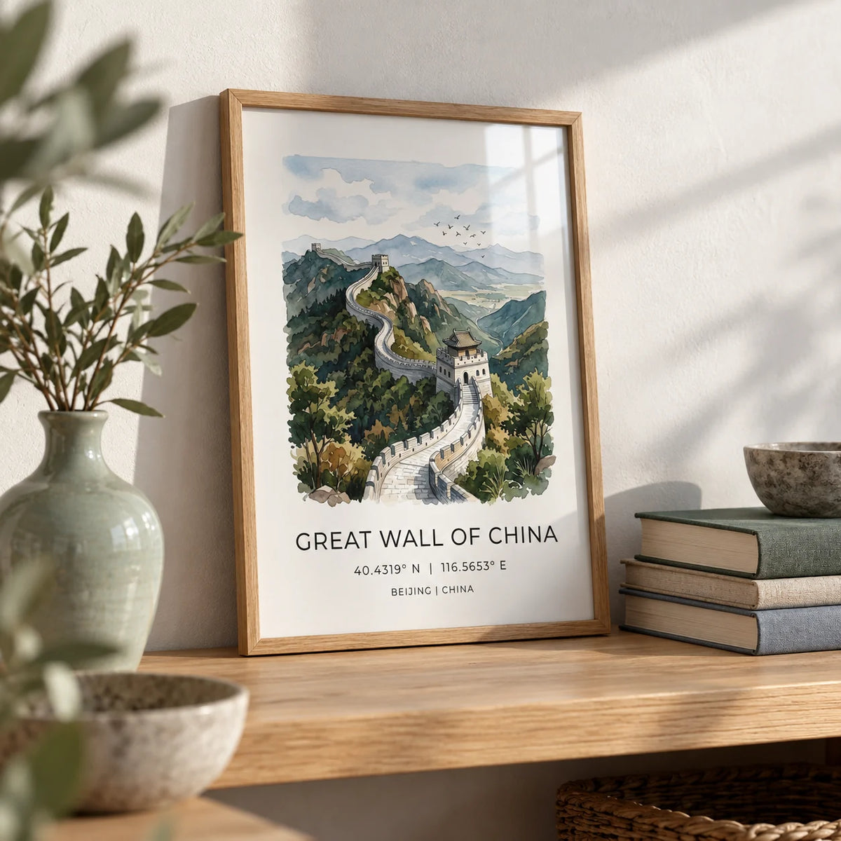 Great Wall Of China Art Print, a small A4 framed print leaning on an oak shelf in a living room