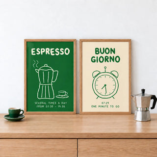 Green Kitchen Prints Set of 2 as a small pair leaning on an oak counter: Espresso Hours and Morning Bells shown framed side by side (frames not included)