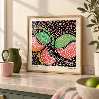 Green Pink Art, a small A4 framed print leaning on a pale stone kitchen worktop