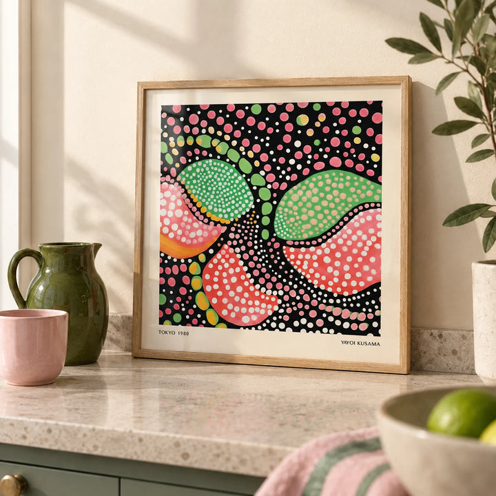 Green Pink Art, a small A4 framed print leaning on a pale stone kitchen worktop