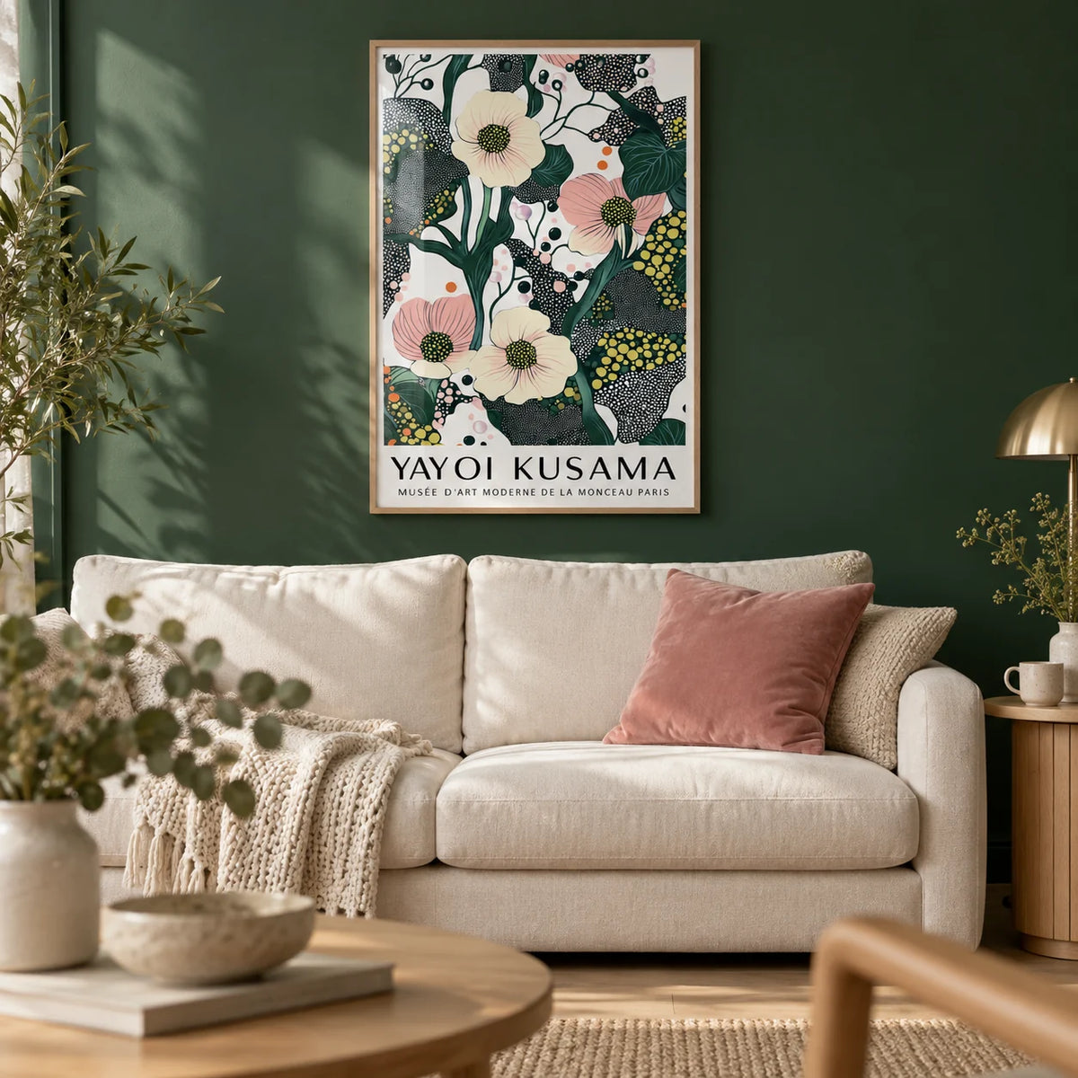 Green Pink Wall Art, framed on the wall of a calm living room with a deep forest green painted wall and a light oak floor