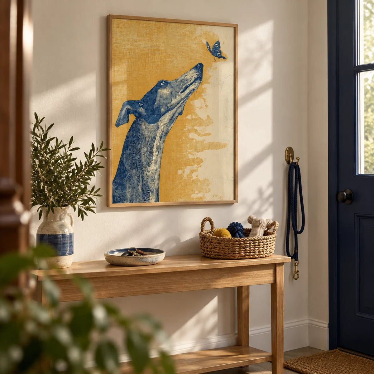 Greyhound Wall Art, framed on the wall of a hallway by the front door