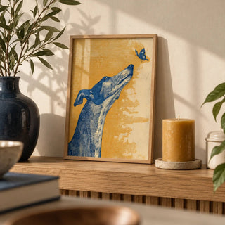 Greyhound Wall Art, a small A4 framed print leaning on an oak shelf in a living room