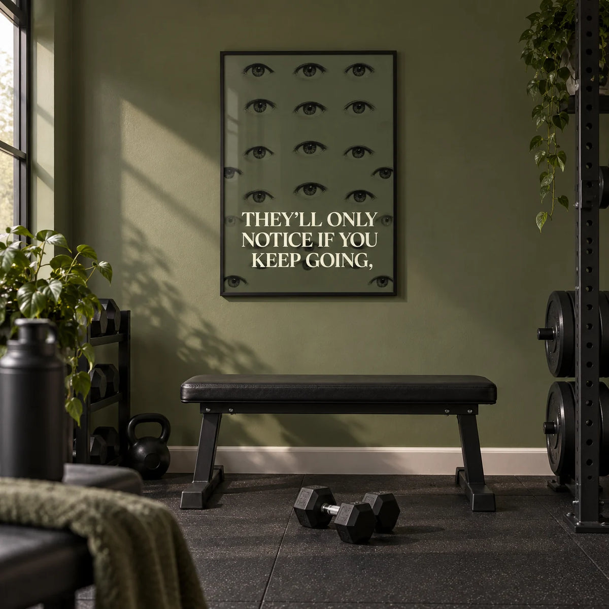 Gym Artwork, framed on the wall of a home gym in a converted spare room with one plain olive green wall and black rubber flooring