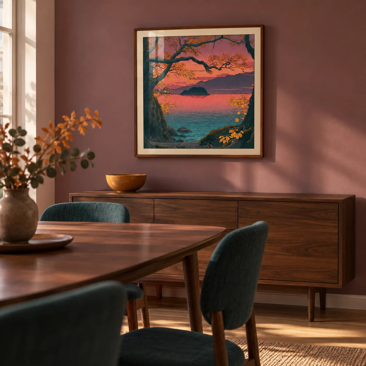 Hasui Kawase Autumn Lake, framed on the wall of a warm modern dining room in a UK flat with a dusty mauve wall and walnut dining furniture