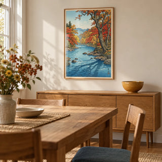 Hasui Kawase Autumn Print, framed on the wall of a restrained dining room in a UK garden flat with warm white walls and a solid oak dining table with plain wooden chairs