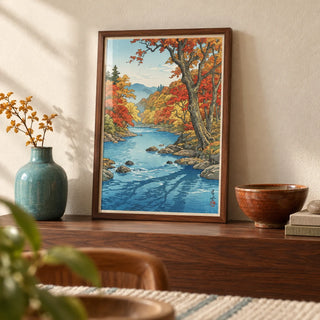 Hasui Kawase Autumn Print, a small A4 framed print leaning on a walnut shelf in a living room
