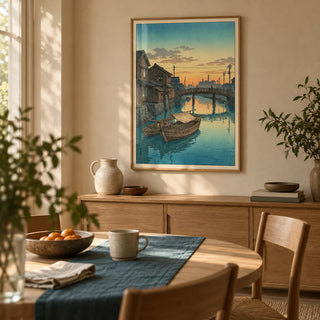 Hasui Kawase Boat Canal Print, framed on the wall of a compact dining nook in a thoughtfully furnished UK flat with pale clay plaster walls