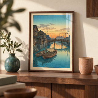 Hasui Kawase Boat Canal Print, a small A4 framed print leaning on a walnut shelf in a living room