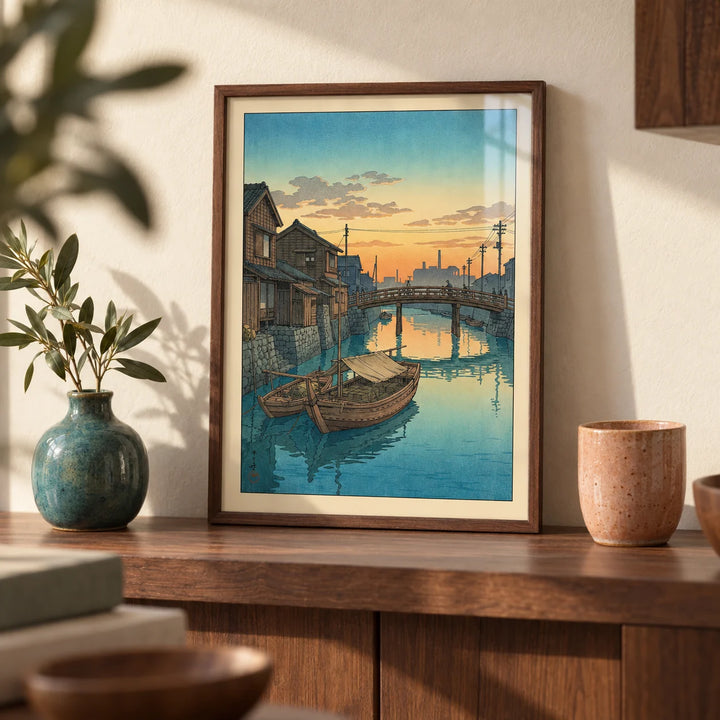 Hasui Kawase Boat Canal Print, a small A4 framed print leaning on a walnut shelf in a living room