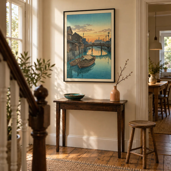 Hasui Kawase Boat Canal Print, framed on the wall of a welcoming narrow hallway in a UK terraced house with warm cream walls and original timber floorboards