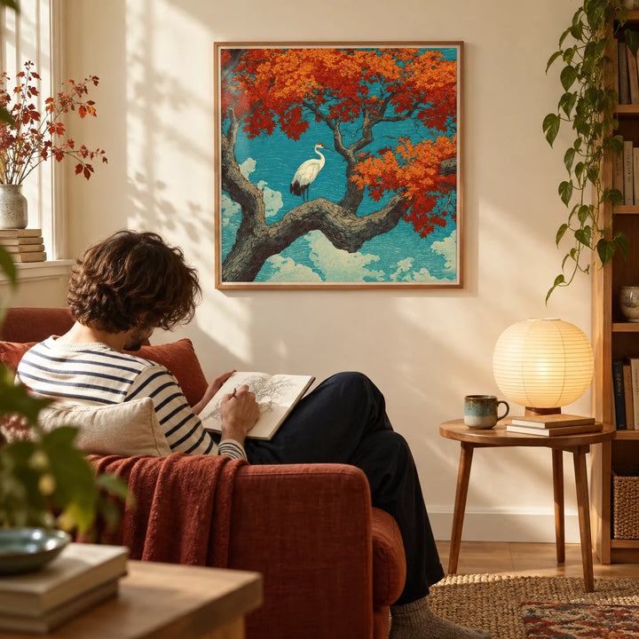 Hasui Kawase Crane Print, framed on the wall of a reading corner in a calm flat with a warm cream wall in a living room