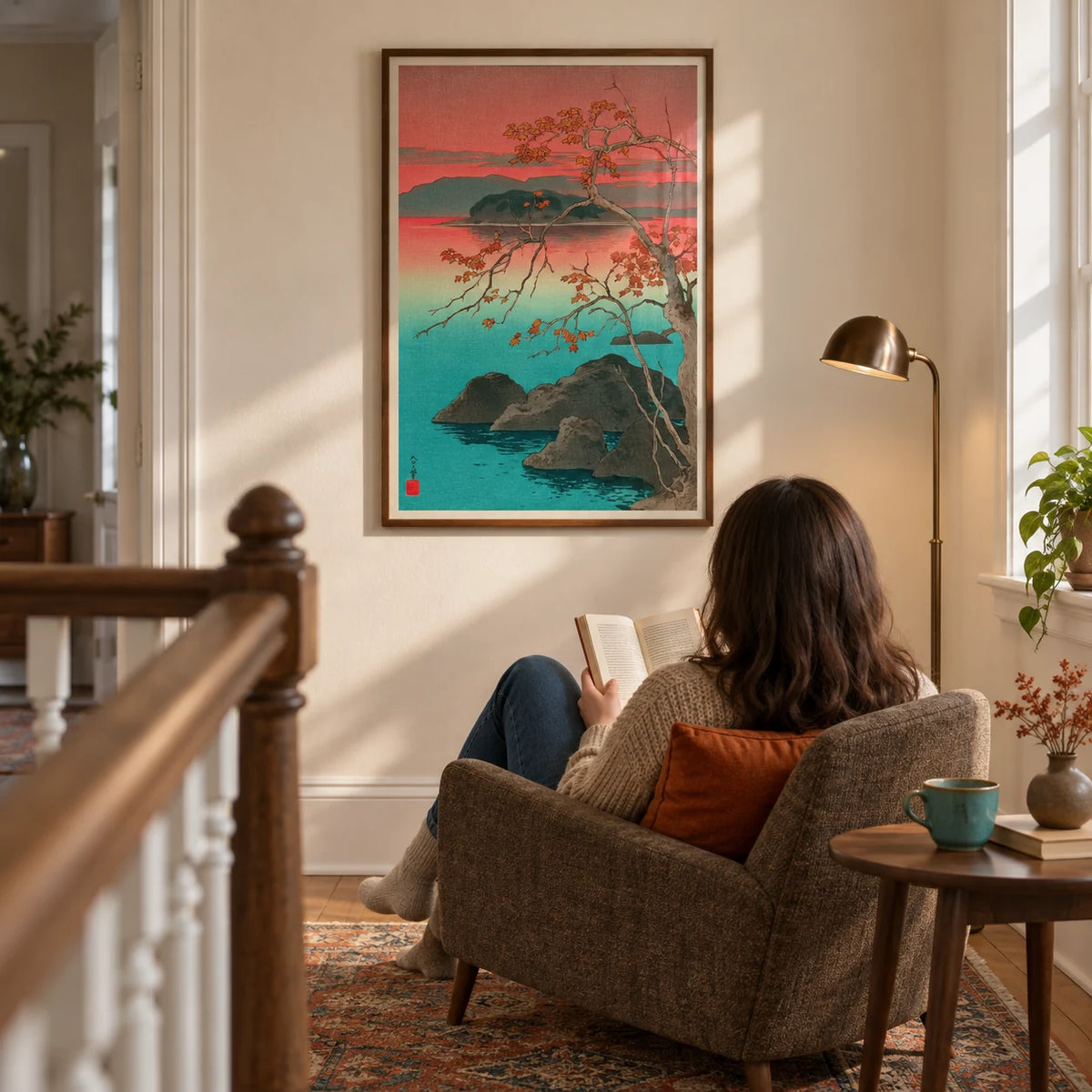 Hasui Kawase Maple Leaves Print, framed on the wall of a quiet reading corner on a spacious terraced-house landing with a warm white wall in a living room