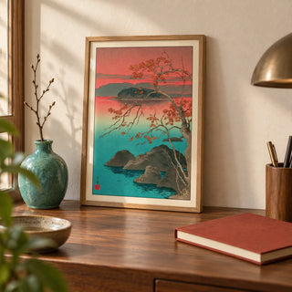 Hasui Kawase Maple Leaves Print, a small A4 framed print leaning on a walnut writing desk
