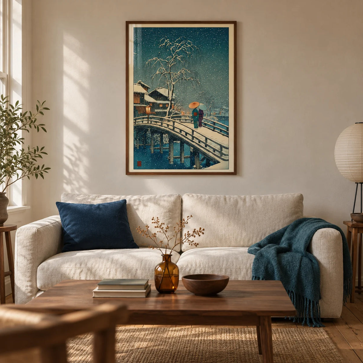 Hasui Kawase Snow Print, framed on the wall of a calm Japanese-influenced living room in a UK Victorian terrace with warm off-white plaster walls and original timber floorboards