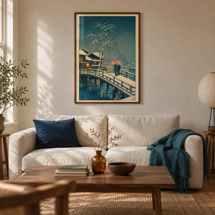 Hasui Kawase Snow Print, framed on the wall of a calm Japanese-influenced living room in a UK Victorian terrace with warm off-white plaster walls and original timber floorboards