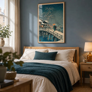 Hasui Kawase Snow Print, framed on the wall of a peaceful bedroom in a UK townhouse with a muted blue wall and pale oak furniture