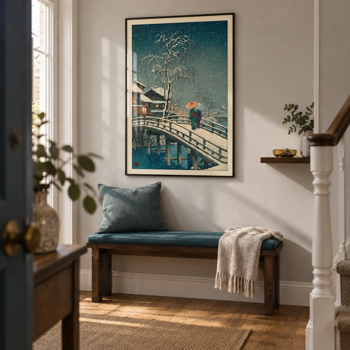 Hasui Kawase Snow Print, framed on the wall of a welcoming hallway in a compact UK terraced home with pale grey plaster walls and warm timber flooring