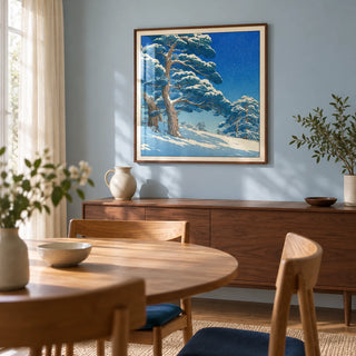 Hasui Kawase Snowy Pines Art Print, framed on the wall of a compact Japanese-influenced dining room in a UK home with a pale blue painted wall