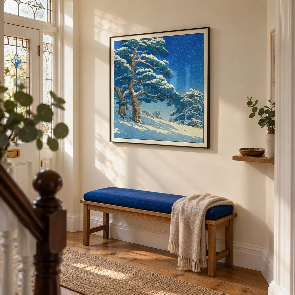 Hasui Kawase Snowy Pines Art Print, framed on the wall of a welcoming hallway in a Victorian terrace with pale cream walls and warm oak floorboards