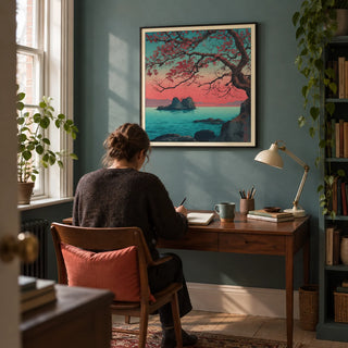 Hasui Kawase Sunset Seascape Print, framed on the wall of a quiet home study in a UK terraced house with a muted teal wall and pale timber floor