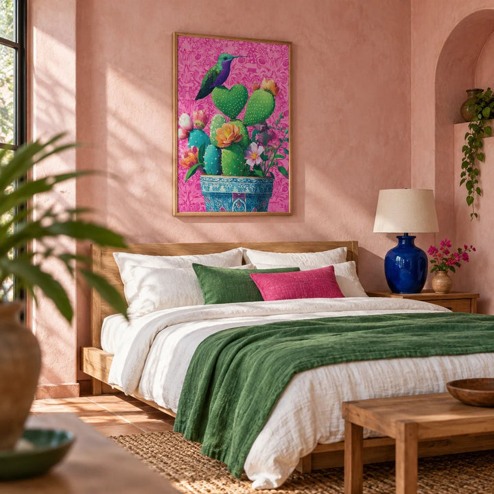 Heart Shaped Cactus, framed on the wall of a Mexican-modern bedroom with a soft pink limewashed wall and an arched niche