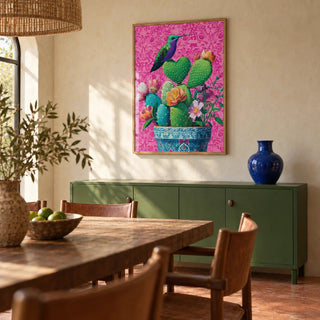 Heart Shaped Cactus, framed on the wall of a Mexican-modern dining room with limewashed walls and a plain terracotta floor