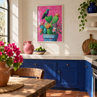 Heart Shaped Cactus, framed on the wall of a Mexican-modern kitchen with smooth white plaster walls and solid cobalt blue painted cabinets