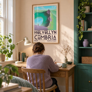 Helvellyn Cumbria Wall Art, framed on the wall of a quiet home study in a UK terrace with a pale peach wall and a built-in emerald cupboard