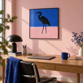 Heron Art Print, framed on the wall of a design-led home office with a pale pink wall