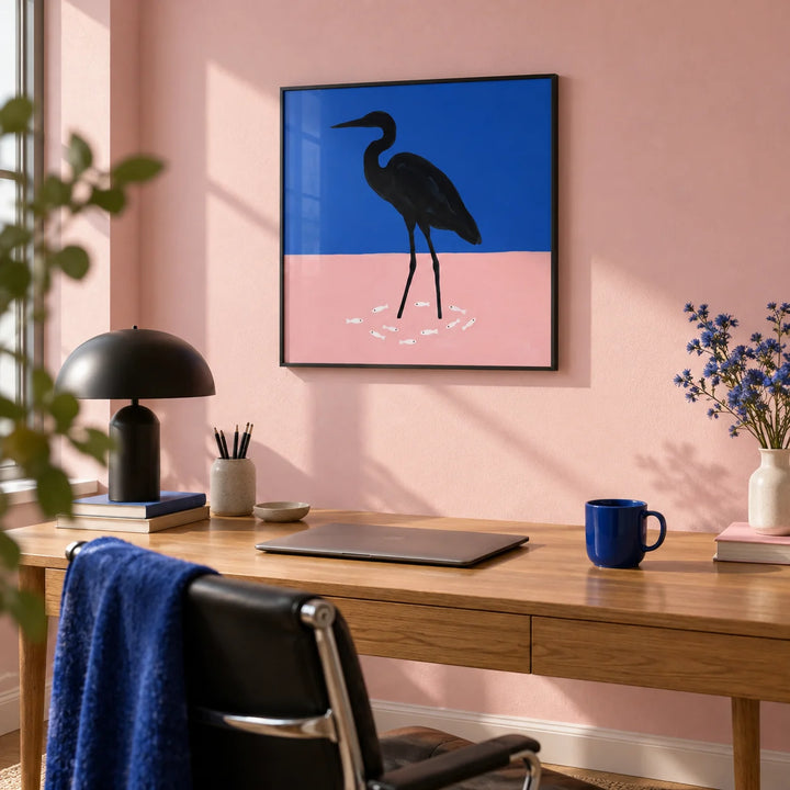 Heron Art Print, framed on the wall of a design-led home office with a pale pink wall