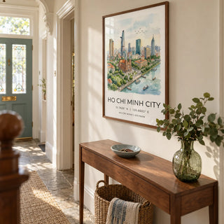Ho Chi Minh City Wall Art, framed on the wall of a welcoming narrow hallway in a Victorian terrace with warm white walls and a plain stone floor