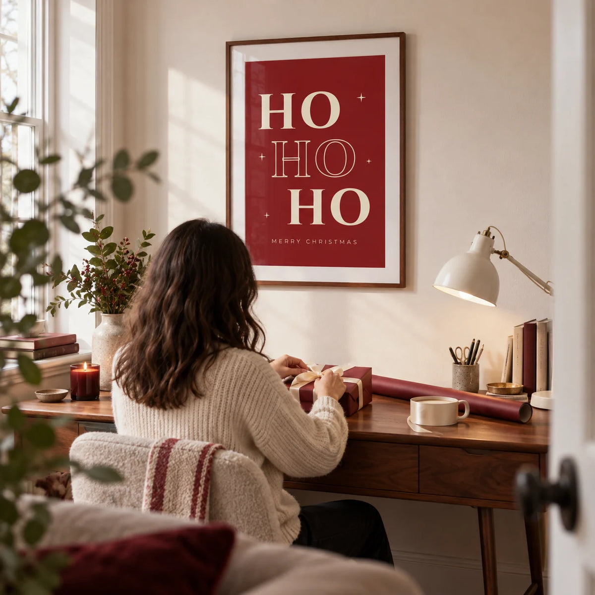 Ho Ho Ho Print, framed on the wall of a compact home study in a design-led UK flat with a warm white wall