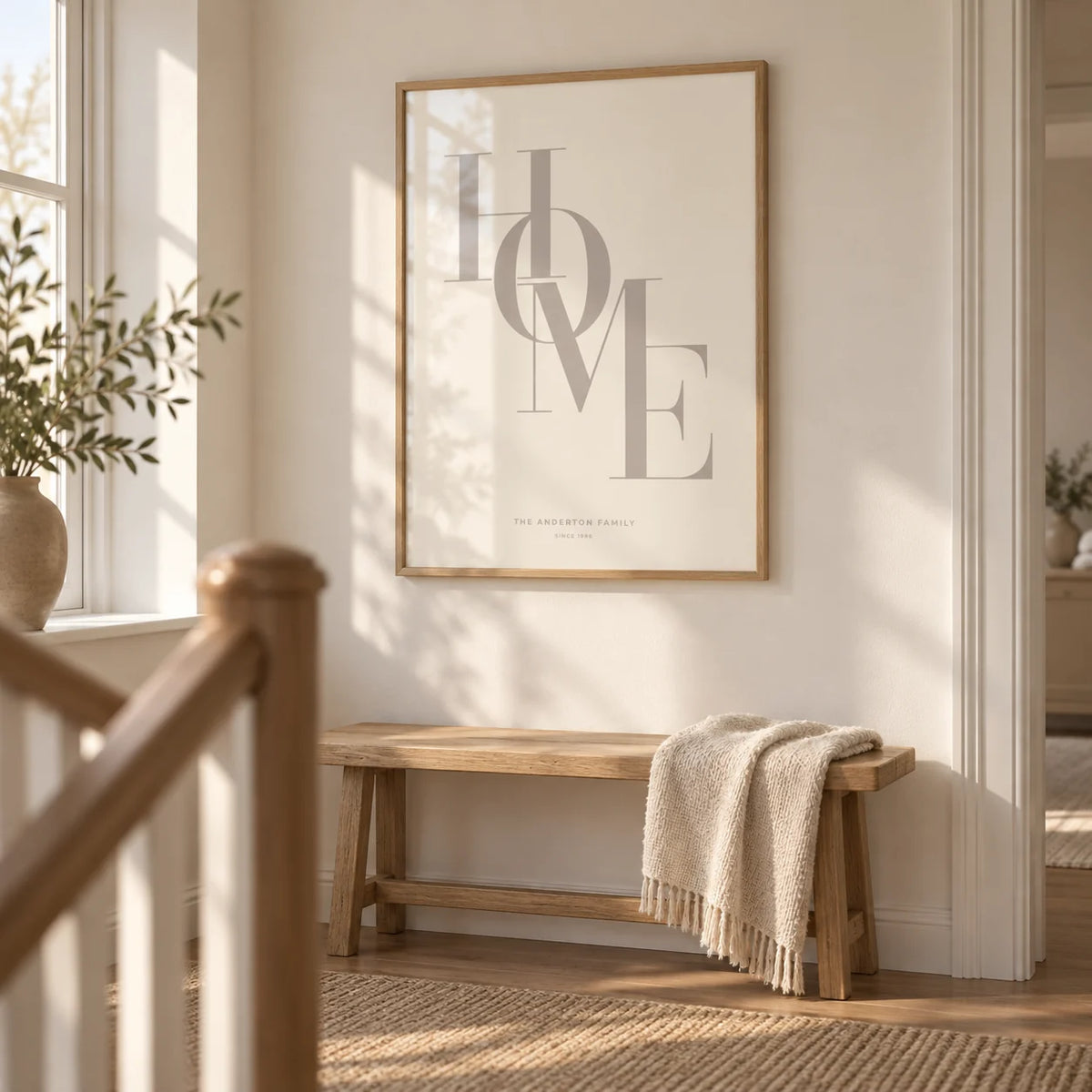 Home Beige Personal Print, framed on the wall of a calm landing at the top of the stairs with a warm white wall