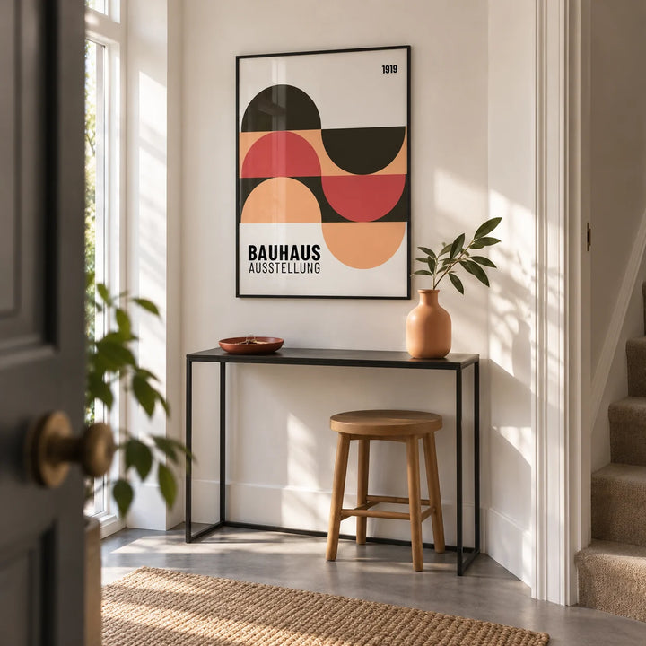Home Office Wall Art, framed on the wall of a bright entrance hallway in a renovated UK maisonette with off-white walls and a plain grey floor