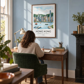Hong Kong Skyline Art Print, framed on the wall of a quiet home study in a Victorian terrace with a pale blue wall and simple walnut furniture