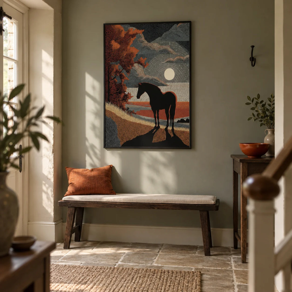 Horse Silhouette Art, framed on the wall of a welcoming hallway in a UK village home with a muted grey-green wall and warm stone flooring