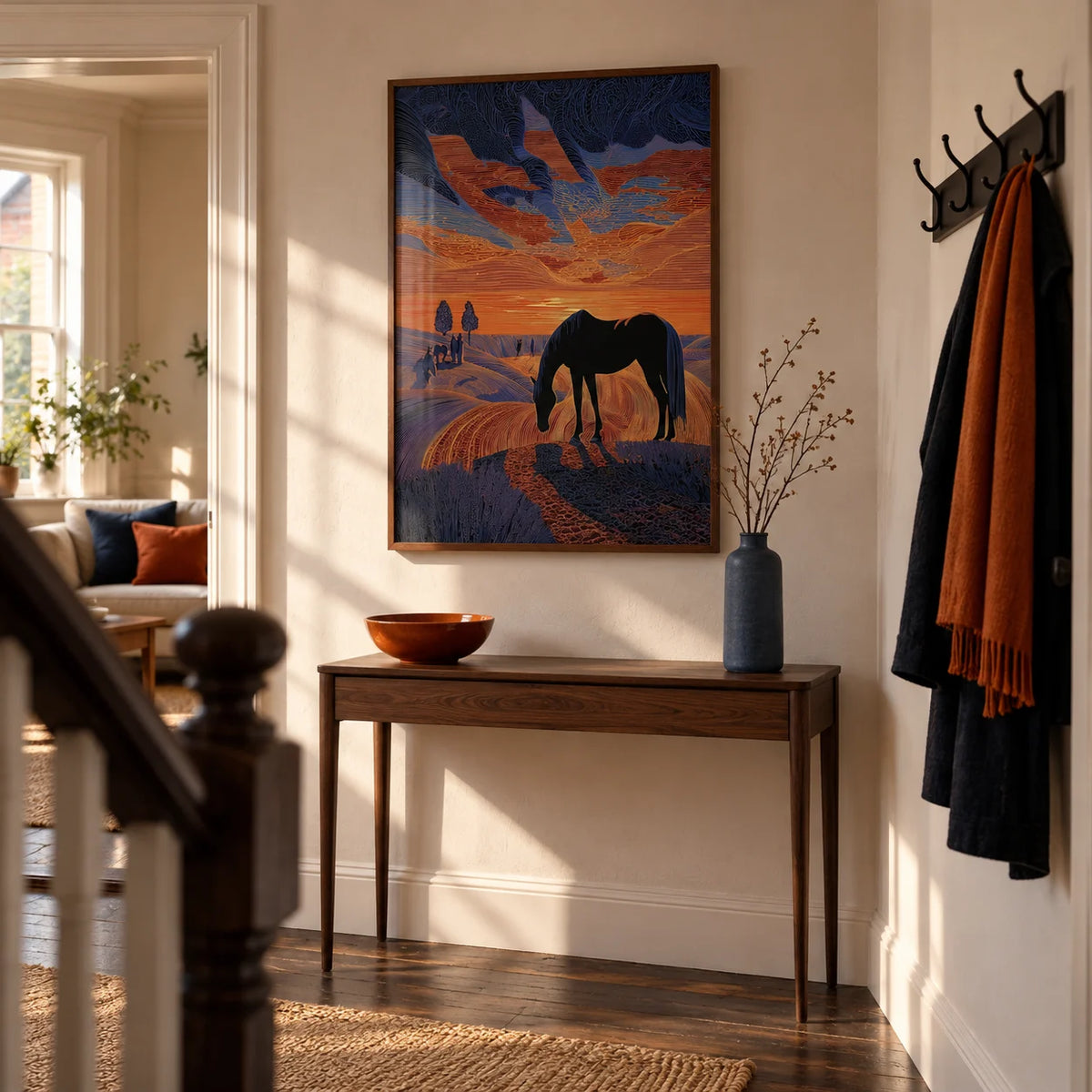 Horse Sunset Art Print, framed on the wall of a characterful hallway in a renovated British semi with warm white plaster walls and dark wooden floorboards