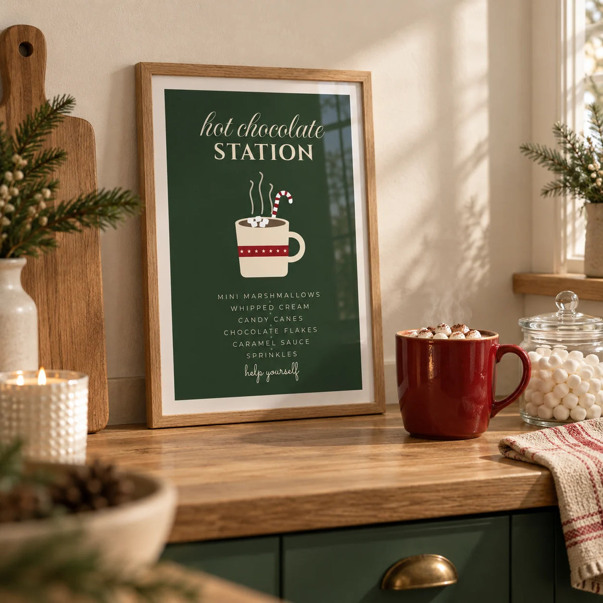 Hot Chocolate Station Print, a small A4 framed print leaning on an oak kitchen worktop