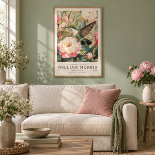 Hummingbird Prints, framed on the wall of a calm cottage living room with a soft sage green painted wall and a pale oak floor