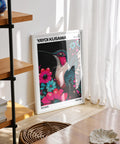 Large colorful wall art featuring a hummingbird and floral elements.