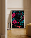 Black cat with teal and pink flowers artwork