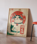 Japanese fortune cat print with a weathered, nostalgic look