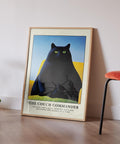 Fat black cat with green eyes sitting on a couch poster.