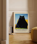 The Couch Commander black cat wall poster with bold colors.