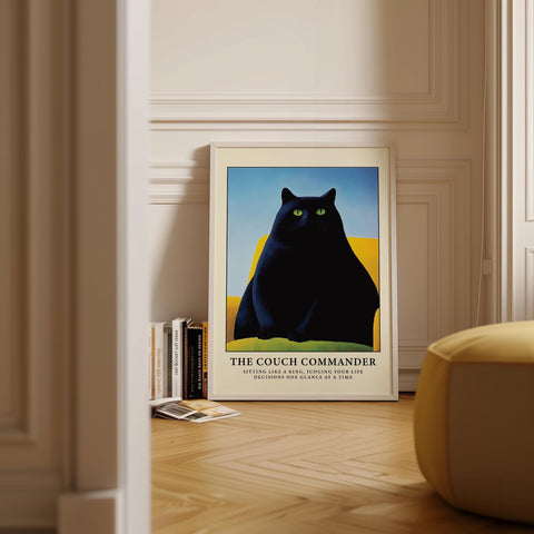 The Couch Commander black cat wall poster with bold colors.