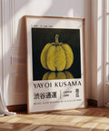 Yayoi Kusama pumpkin artwork with bold yellow and black polka dots.